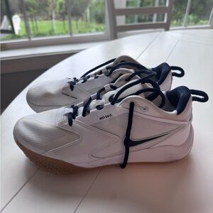 Nike White and Navy volleyball and athletic shoe’s